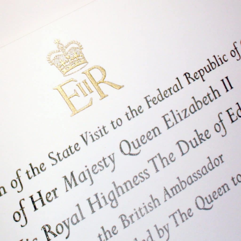 Thermographed text on invitations.